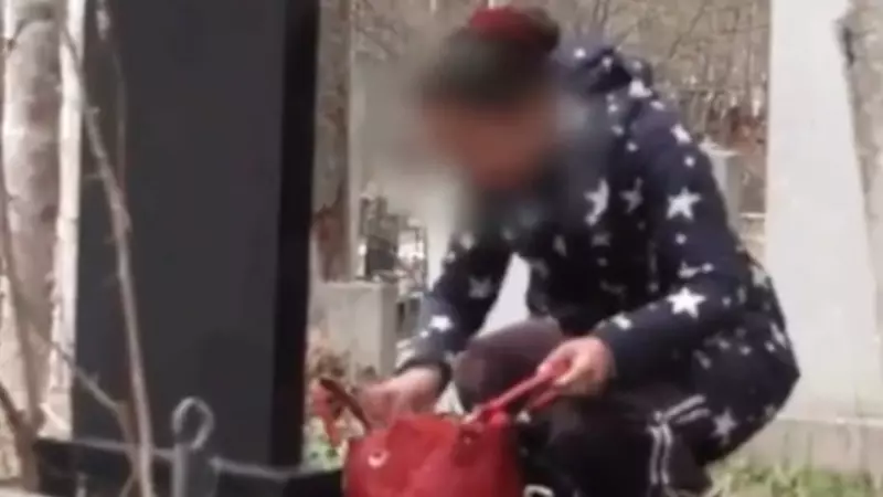 Цыганку, поедающую бутерброды на кладбище, сняли на видео. Сахалинцы за нее заступились