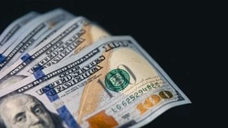 Курс доллара на межбанке 21 ноября опускался ниже 77 рублей 