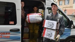 Жители Поронайского района отправили землякам в зону СВО очередную партию посылок