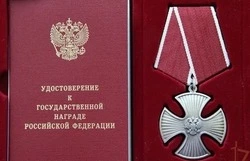 В Холмске жена и родной брат погибшего бойца не поделили Орден Мужества